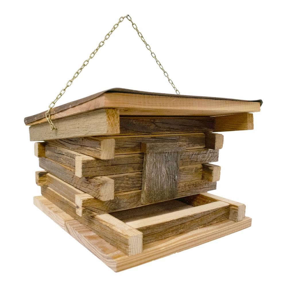 A rustic wooden hanging bird feeder with a chain strap, made from stacked natural wood planks and boards, shown on a plain white background.