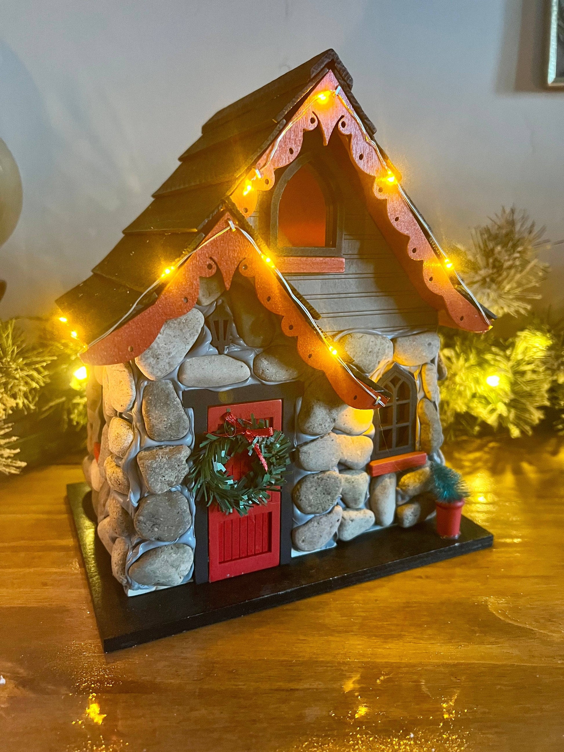 Charlevoix Stone Christmas Cottage with LED lights