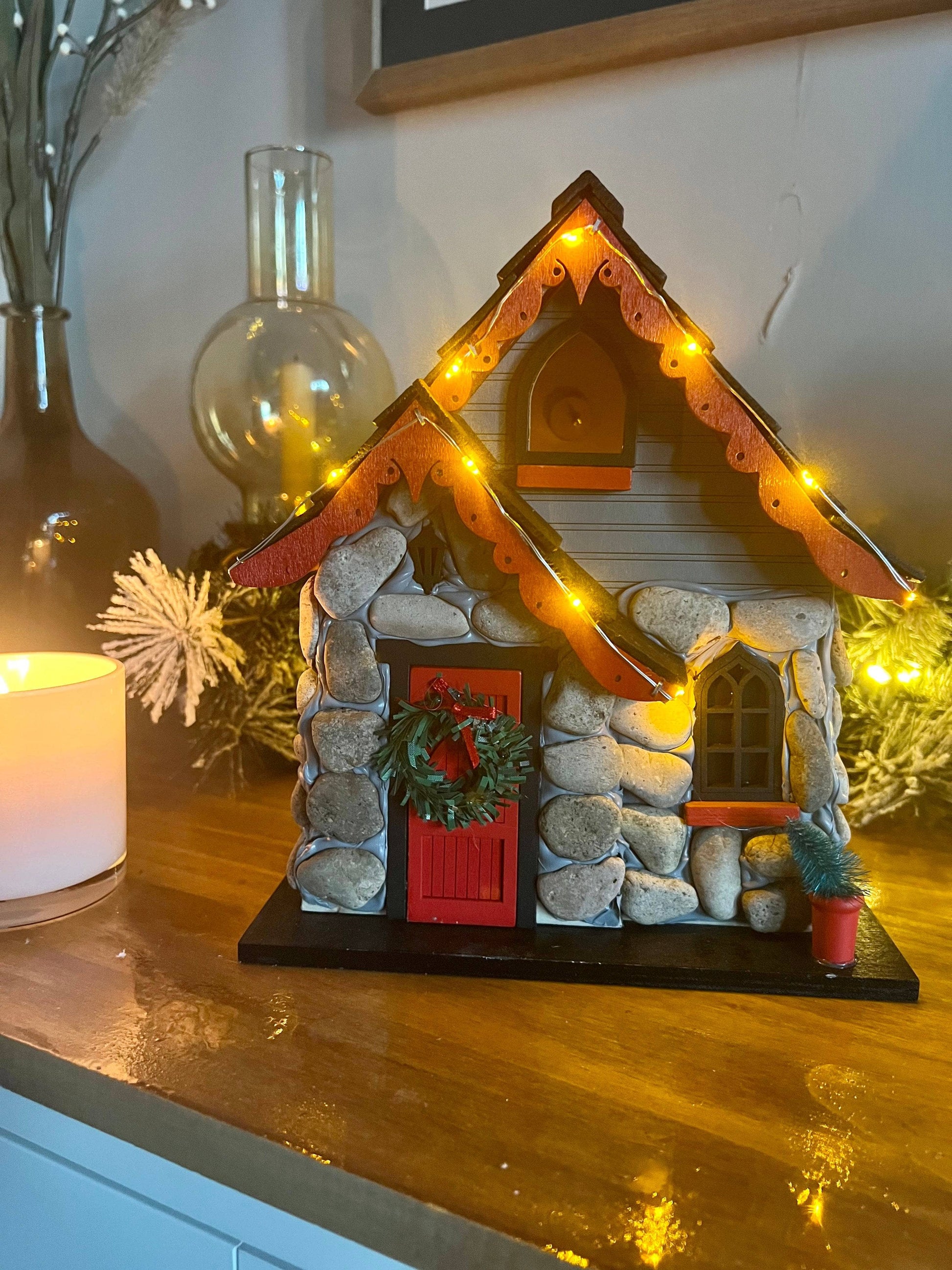 Charlevoix Stone Christmas Cottage with LED lights