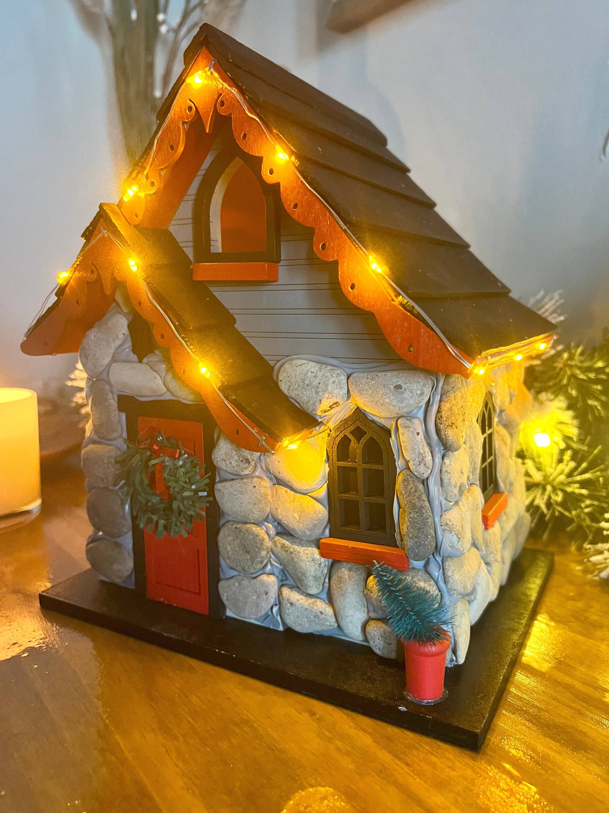 Charlevoix Stone Christmas Cottage with LED lights