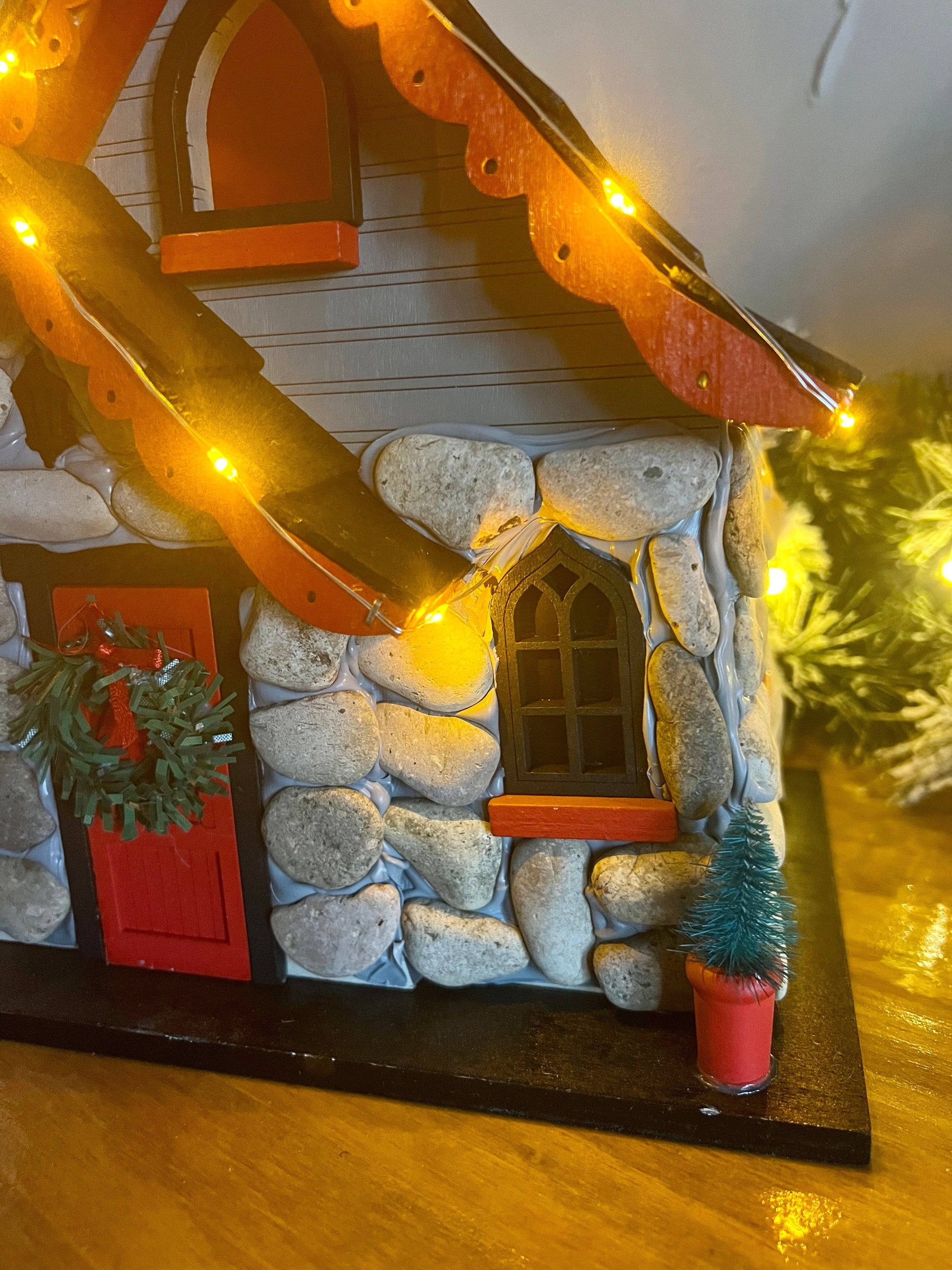 Charlevoix Stone Christmas Cottage with LED lights