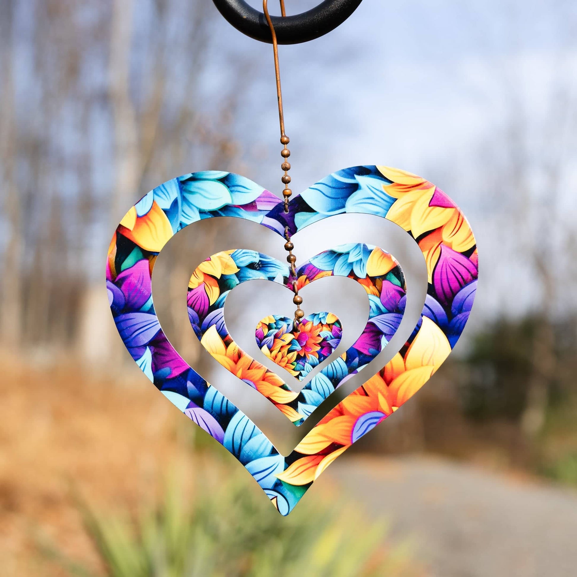 Triple Spinning Heart Multicolor Ornament - Happy Gardens