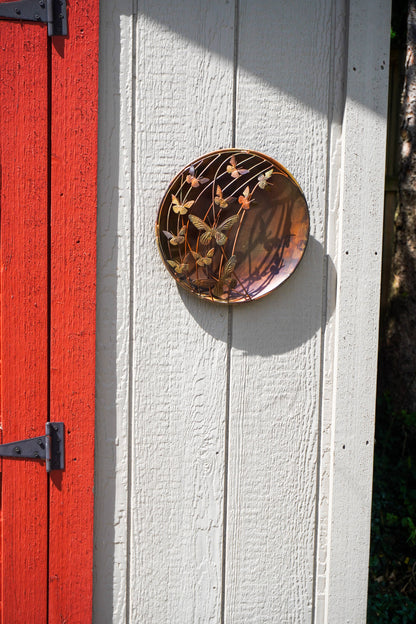 Decorative circular plate on a white wooden door with a red panel