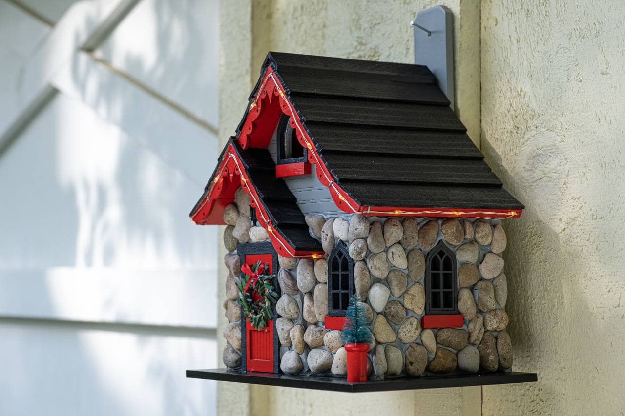 Charlevoix Stone Christmas Cottage with LED lights