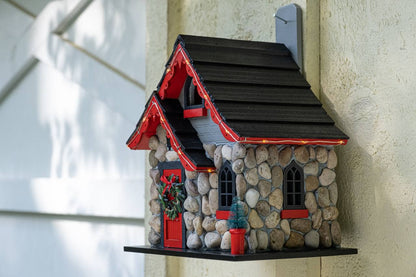 Charlevoix Stone Christmas Cottage with LED lights