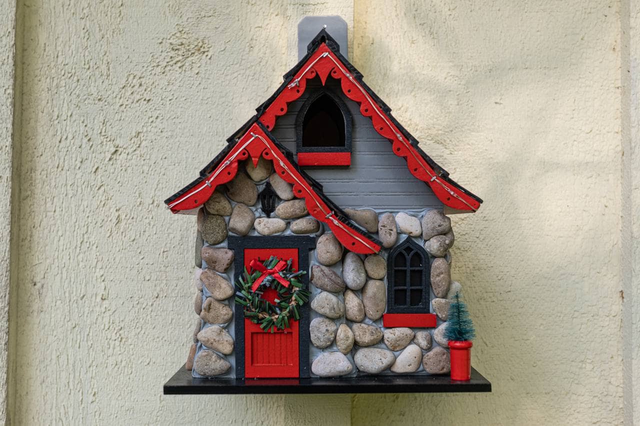 Charlevoix Stone Christmas Cottage with LED lights