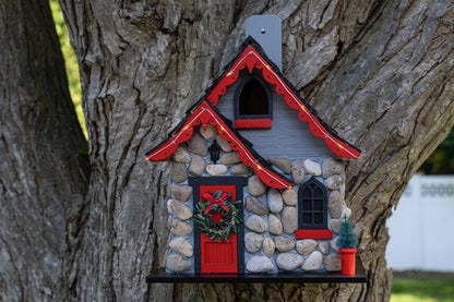 Charlevoix Stone Christmas Cottage with LED lights