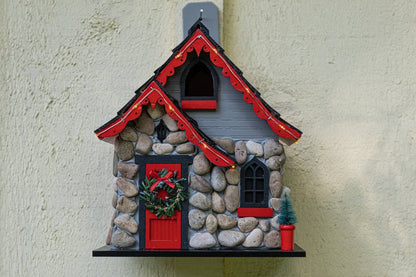 Charlevoix Stone Christmas Cottage with LED lights