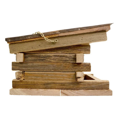 Wooden birdhouse with a rustic design on a white background