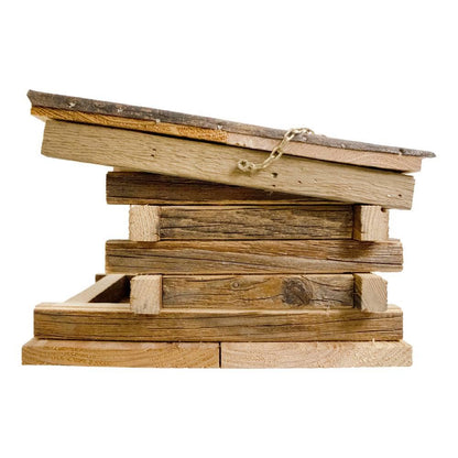 Wooden bird feeder with a rustic design on a white background