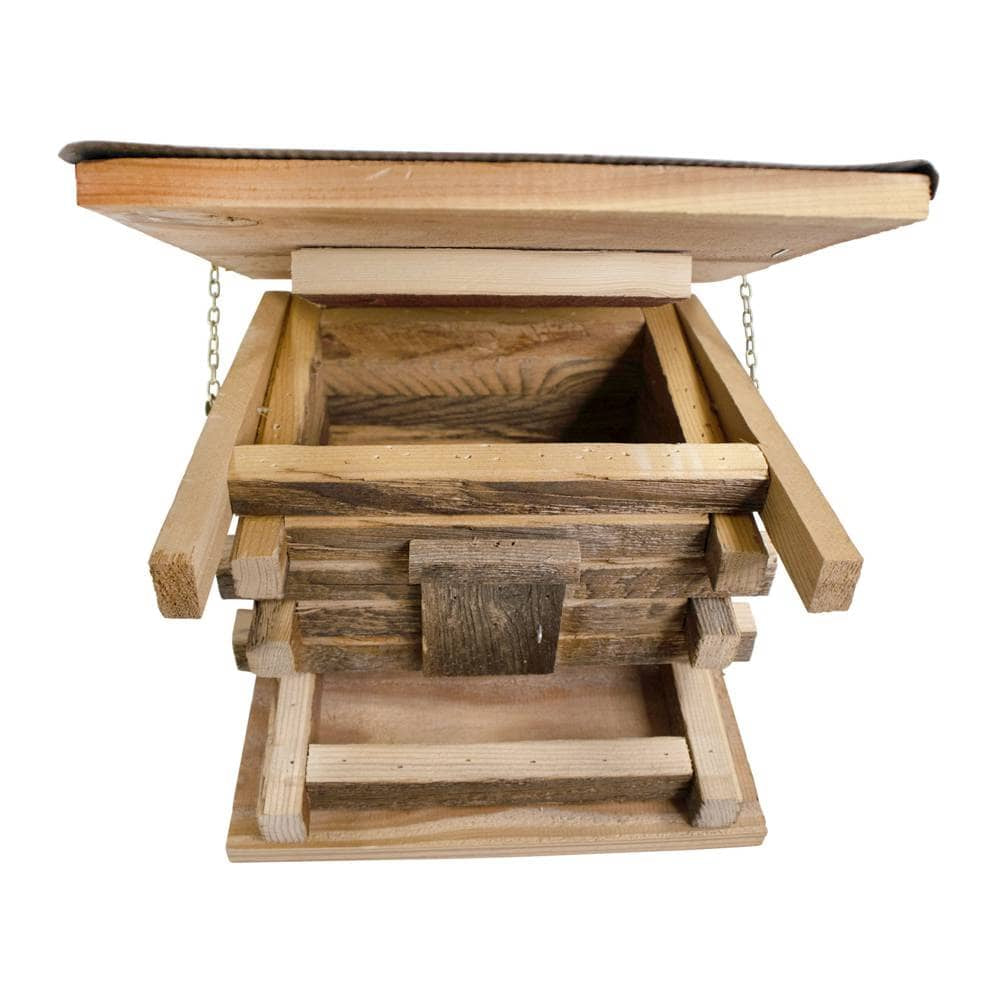 Wooden bird feeder with open design on a white background