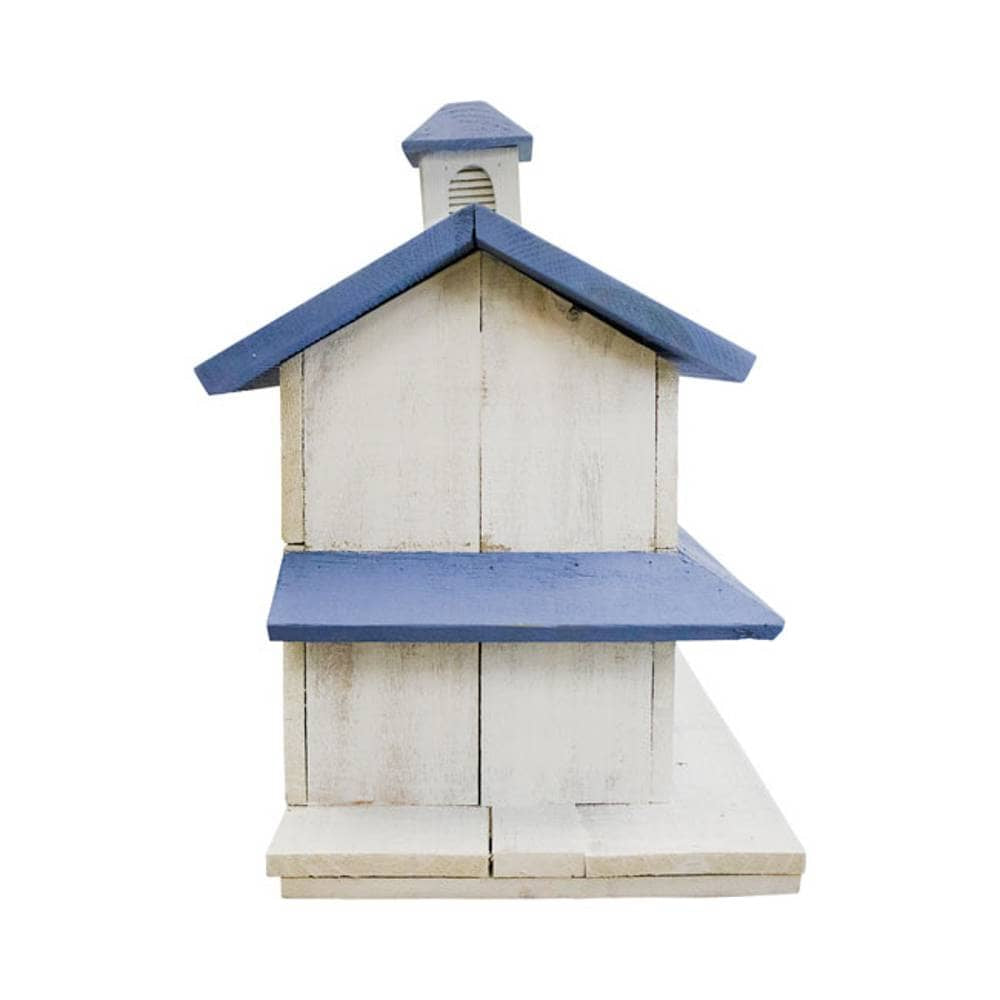 A decorative wooden house-shaped birdhouse or miniature structure with a weathered off-white painted body and blue roof, shown against a plain white background.