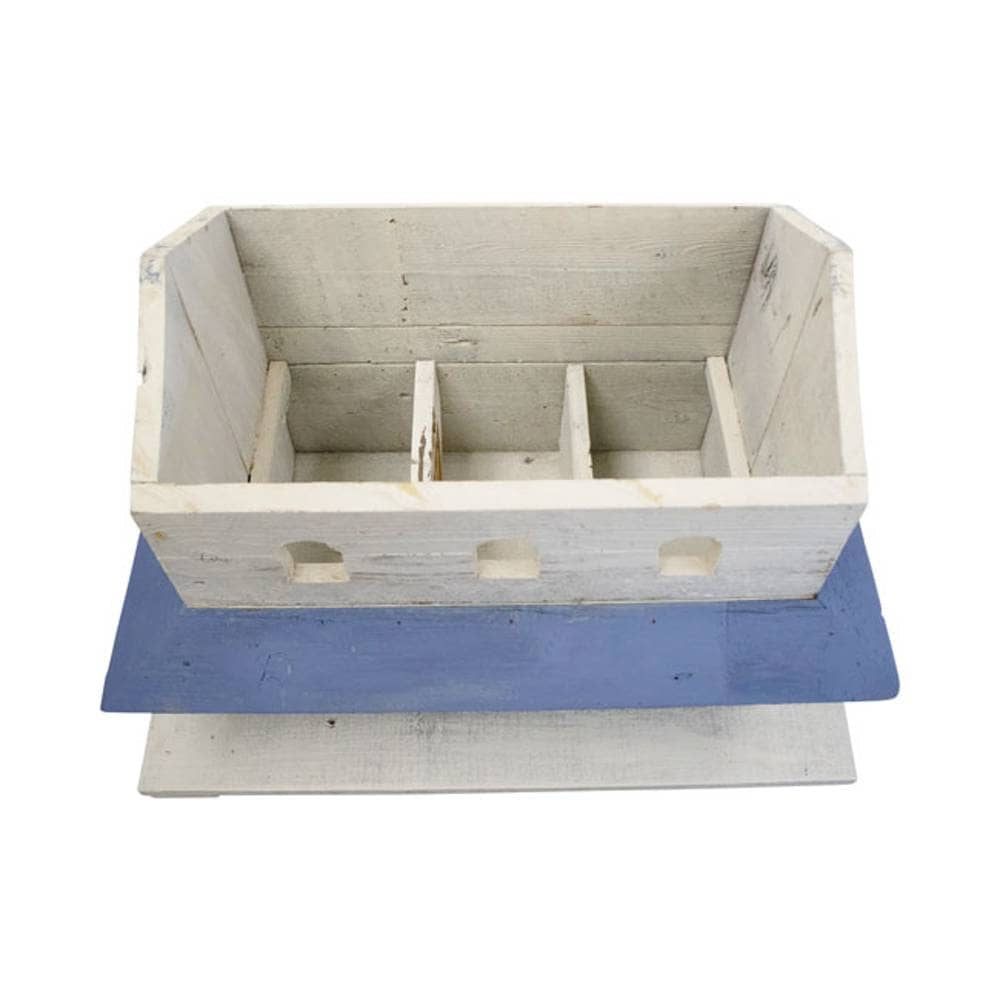 A rustic white-painted wooden box with three interior compartments, resting on a blue rectangular base against a plain white background.