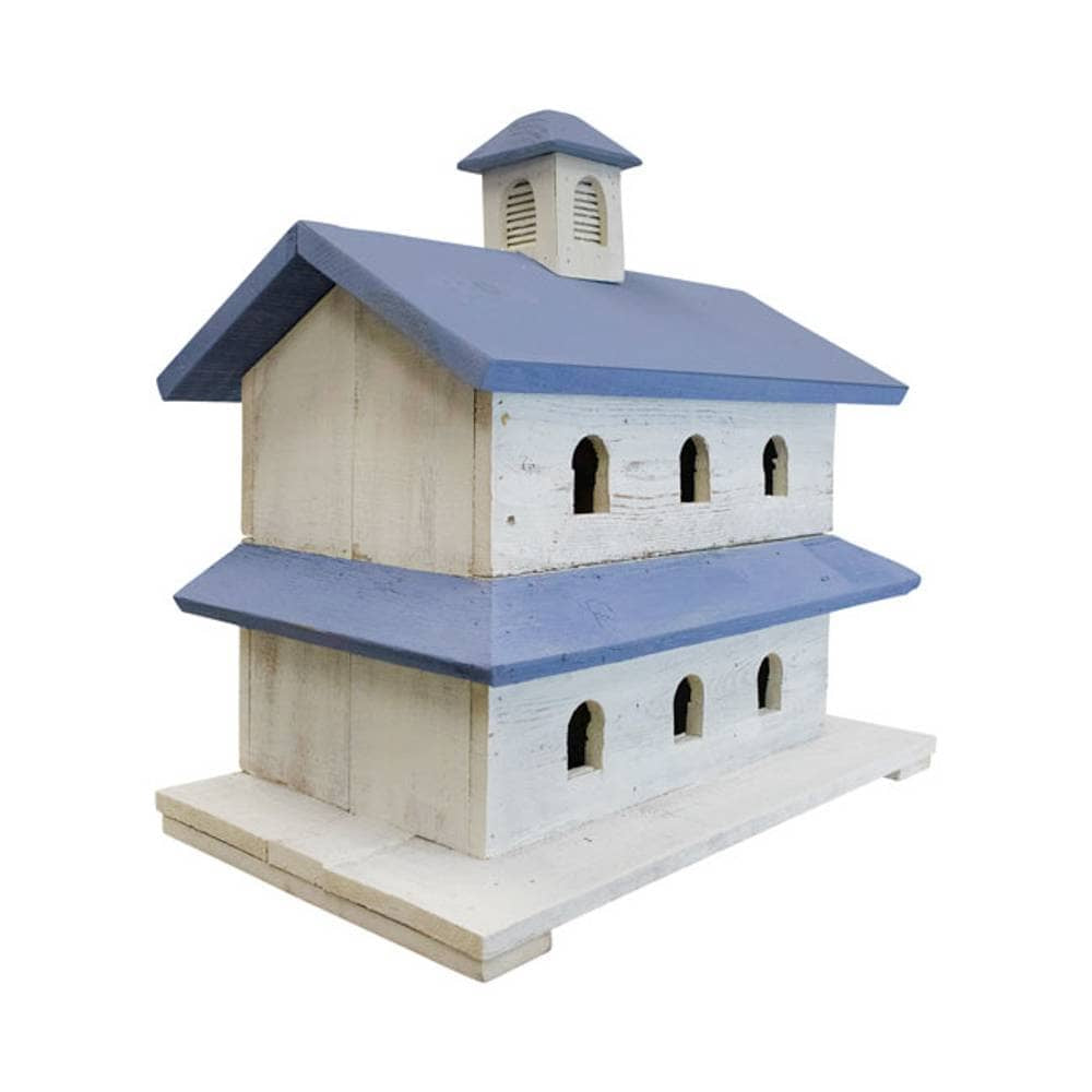 A rustic wooden birdhouse shaped like a two-story church or chapel, featuring a distressed off-white painted wood finish and weathered blue painted roofs, set against a plain white background.