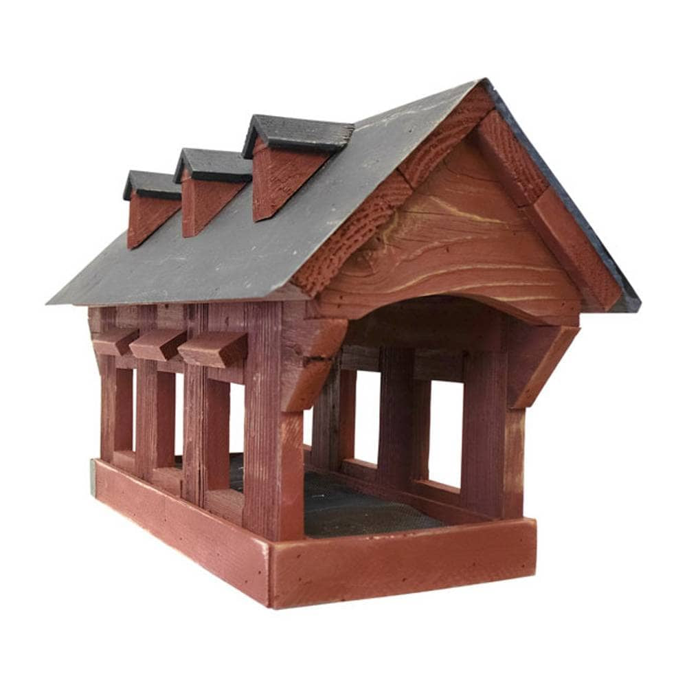 Wooden birdhouse with a brown finish and black roof on a white background