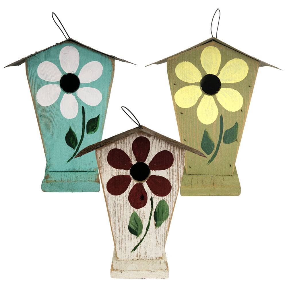 Three rustic wooden birdhouses with hand-painted flower designs in different colorways (teal and white, olive green and yellow, and distressed white and burgundy), arranged on a plain white background.