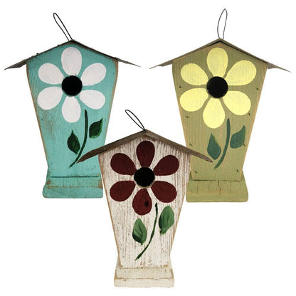 Three rustic wooden birdhouses with hand-painted flower designs in different colorways (teal and white, olive green and yellow, and distressed white and burgundy), arranged on a plain white background.