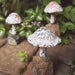 Happy Gardens - Little Fungi on Stone Garden Statue