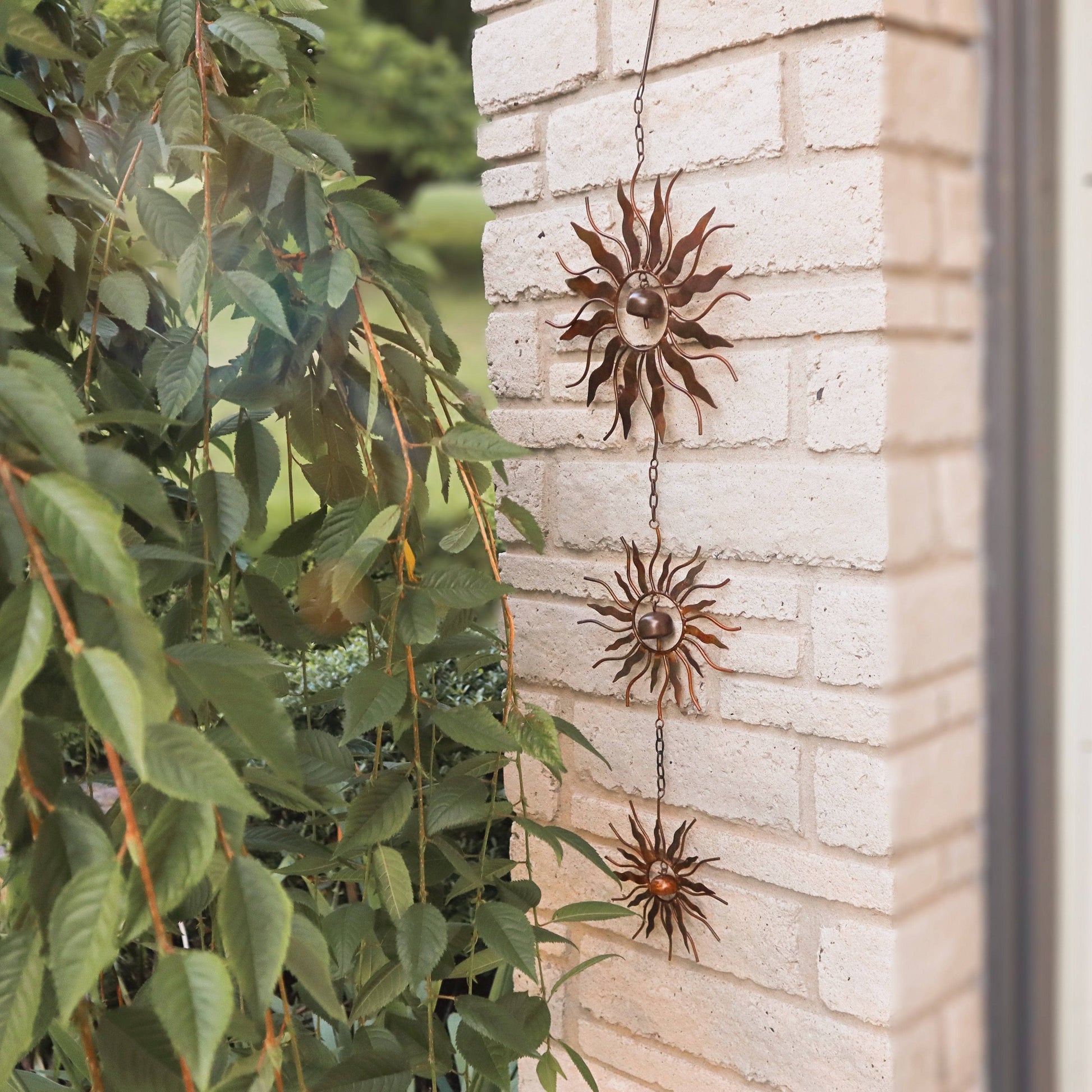 Graduated Sun and Bell Trio Ornament - Happy Gardens